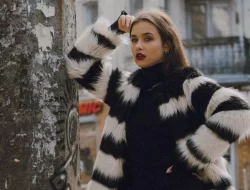 Style Maven's Handbook: Essential Tips for Styling Success woman wearing a white and black striped fur jacket